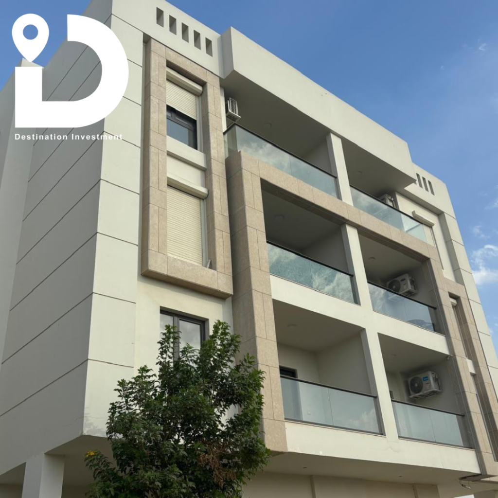 واجهة زجاجية حديثة لمبنى Valore El Thawra – Aljar Development على شارع الثورة